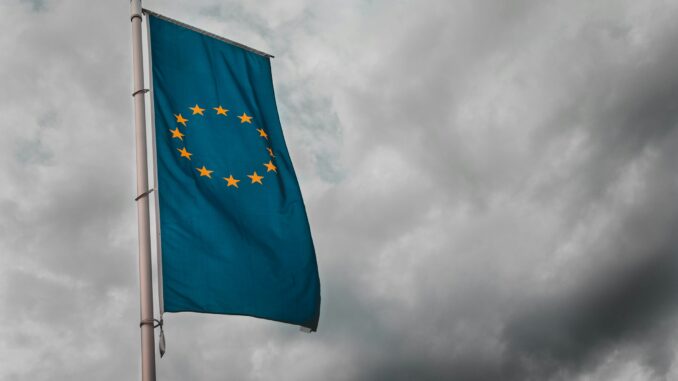 EU flag illustrating an open letter to the European Union spearheaded by Meta that calls for the streamlining of AI regulations.