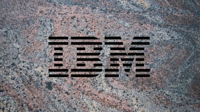 IBM logo on a granite background to illustrate the launch of the company's Granite 3.0 family of AI models alongside an open-source commitment.