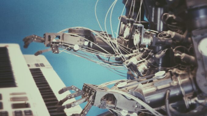 Robot playing a piano illustrating researchers from MIT developing a robot training method that uses AI techniques and a transformer model for improving robotics.