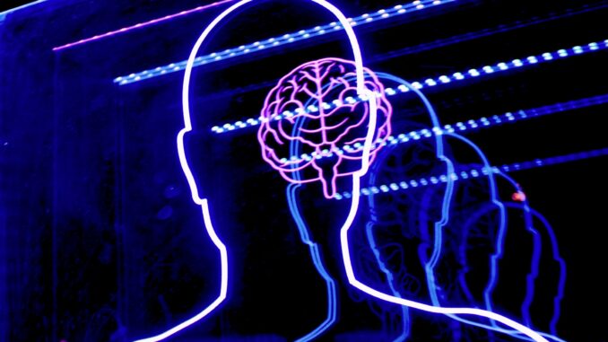 Outline of a person and a digital brain as Anthropic provides a more detailed look into the complex inner workings of their advanced language model Claude to demystify how these sophisticated AI systems process information, learn strategies, and ultimately generate human-like text.