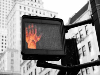 Photo of a halt sign as OpenAI pulls its new GPT-4o image generator from the free tier of ChatGPT after one day amid wider copyright and ethical debates around the use of AI to imitate human creativity.